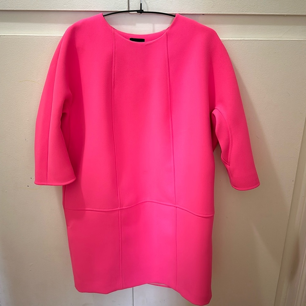 Beautiful solid fuchsia dress with pockets and zipper on the side.